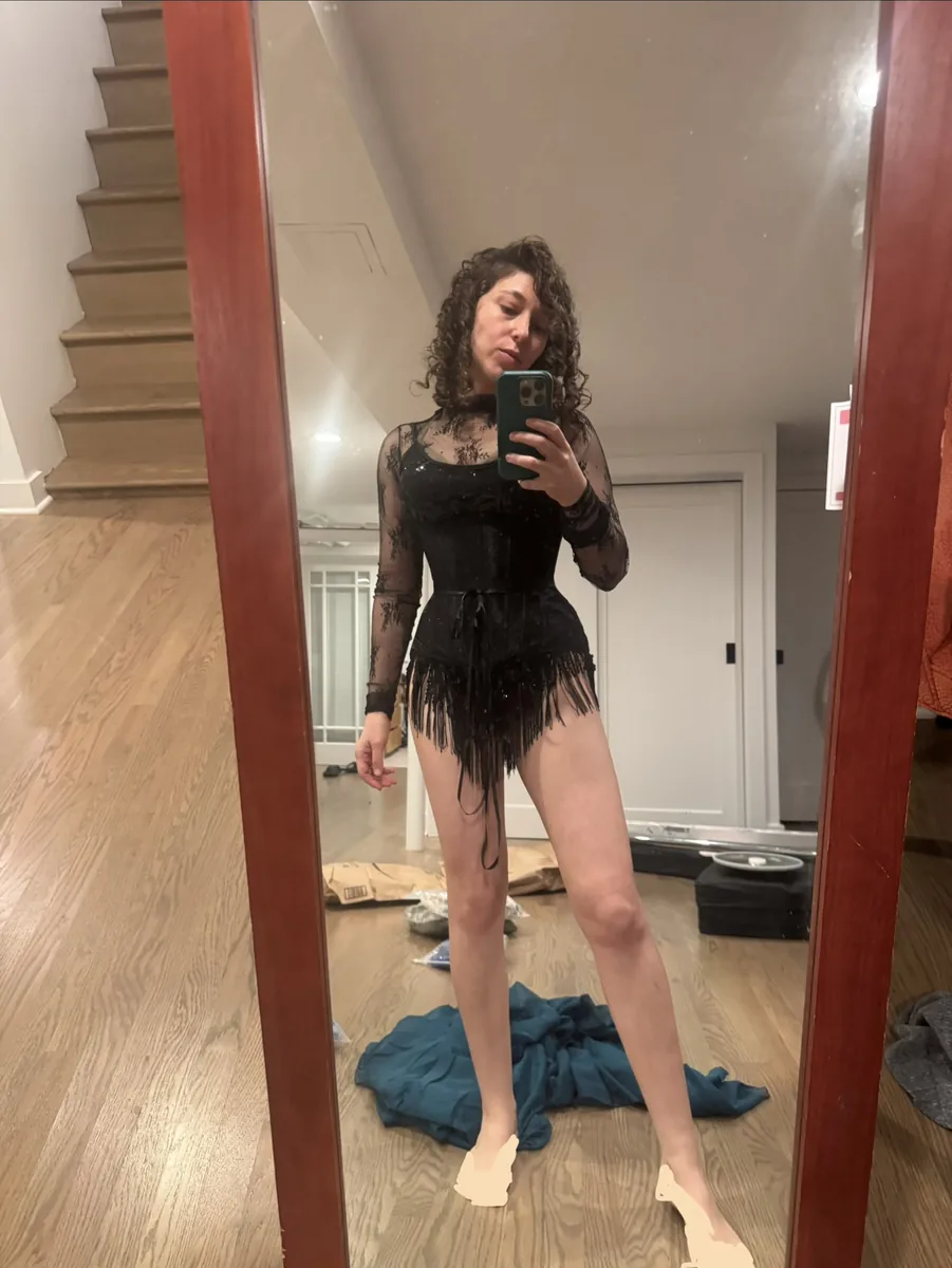Try-on photo of a convertible outfit with a short skirt